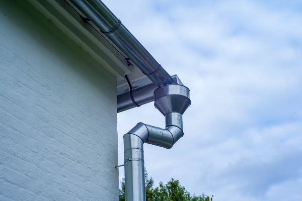 Metal Downspout Replacement in Logan